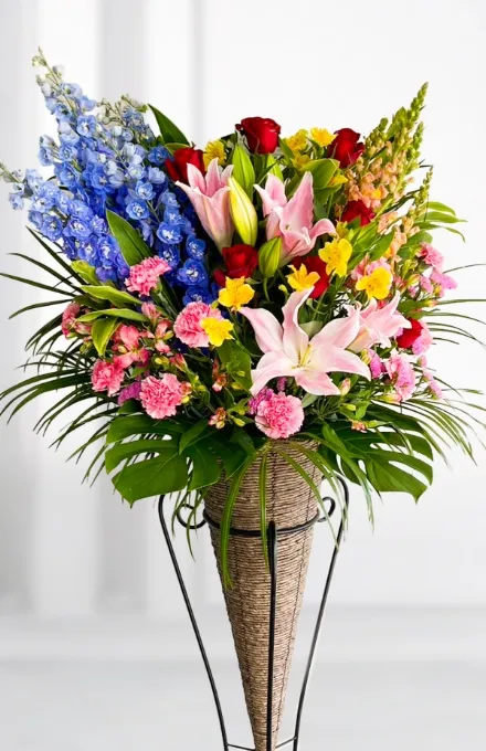 ピンク色がメインのカラフルな色の花のフラワースタンド